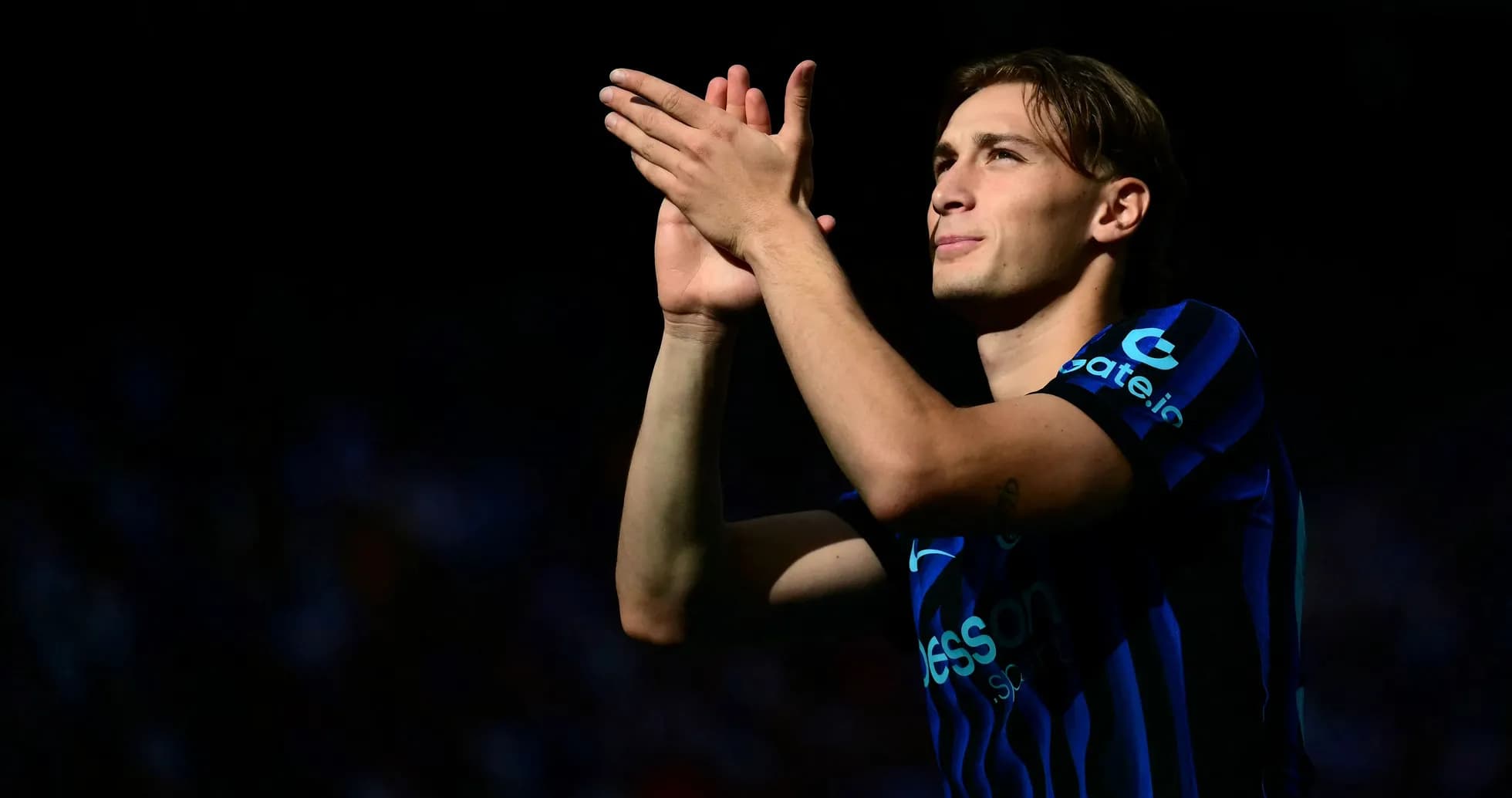 Player applauding fans in stadium during match Player applauding fans in stadium during match