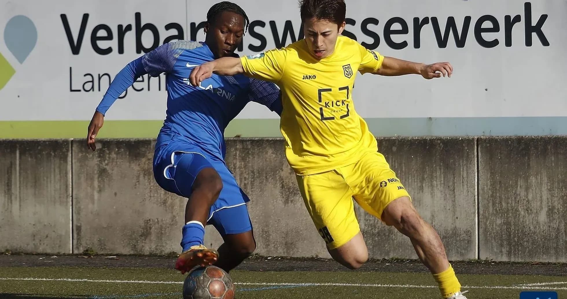 Players competing for the ball in Oberliga match Players competing for the ball in Oberliga match