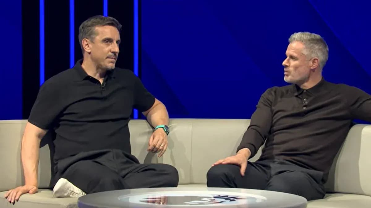 Two analysts discussing on a studio couch Two analysts discussing on a studio couch