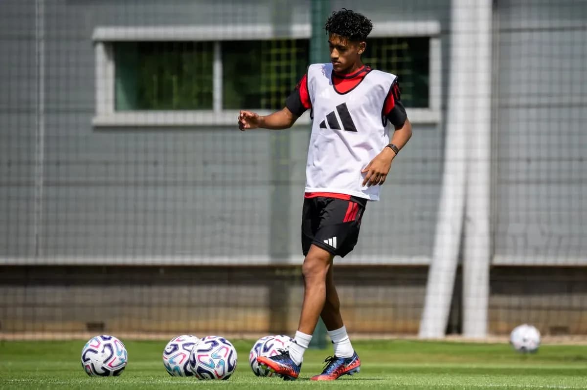 Player dribbling soccer ball during training session Player dribbling soccer ball during training session