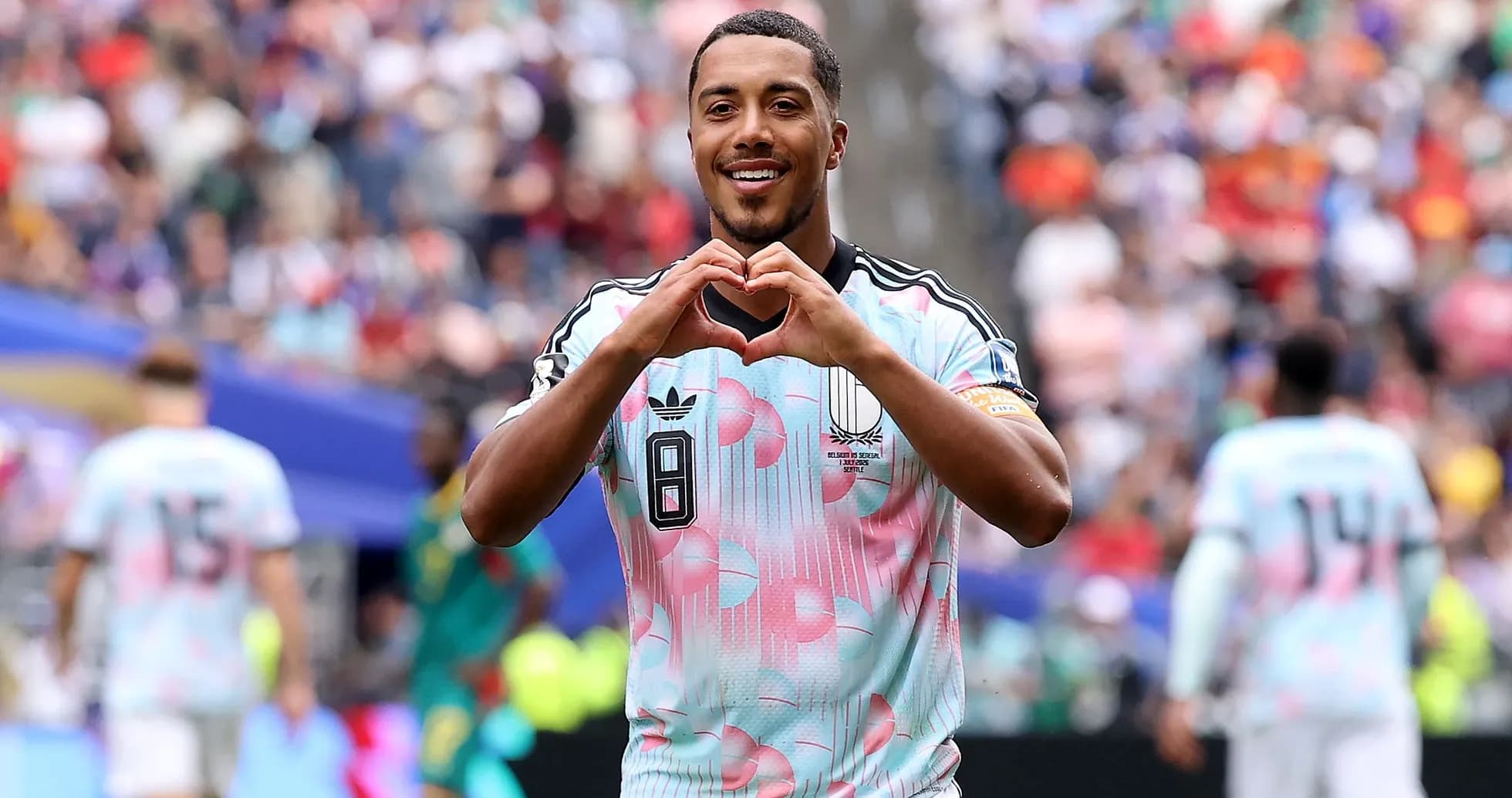 Player celebrating by making heart shape gesture Player celebrating by making heart shape gesture