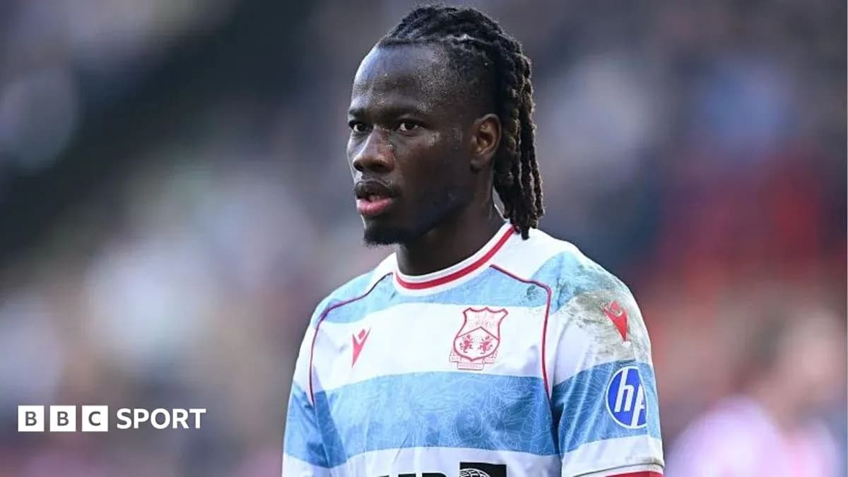 Player wearing striped jersey during match Player wearing striped jersey during match