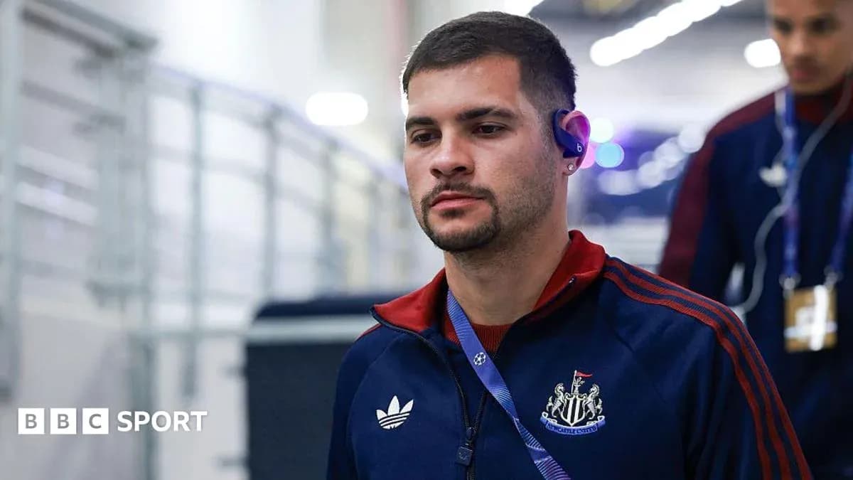 Player arriving at stadium wearing team tracksuit Player arriving at stadium wearing team tracksuit
