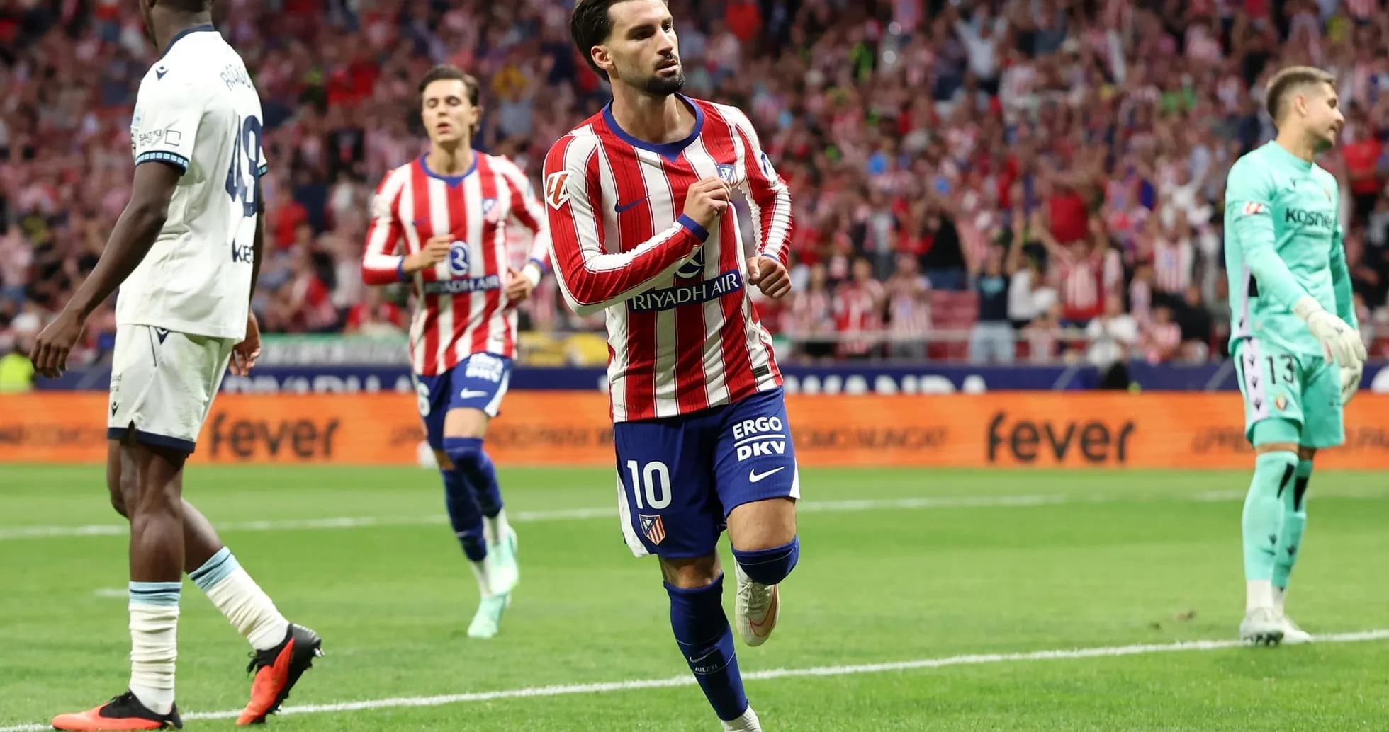 Atletico Madrid player celebrating a goal Atletico Madrid player celebrating a goal