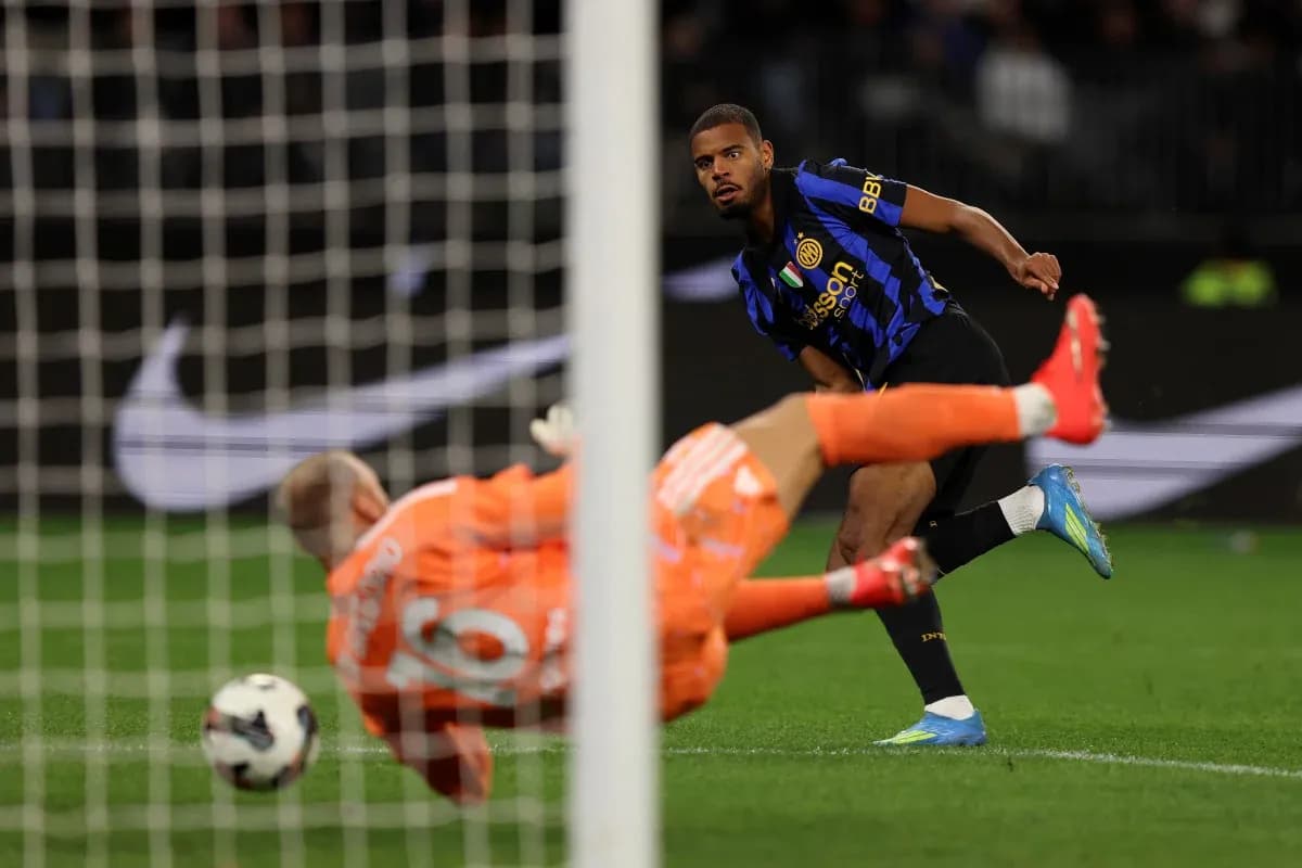 Player striking the ball during a penalty kick Player striking the ball during a penalty kick