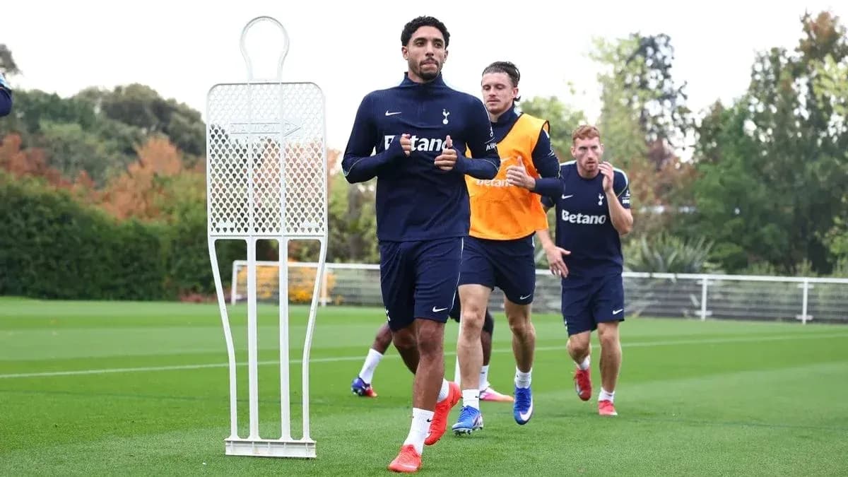 Tottenham players jogging during training session Tottenham players jogging during training session