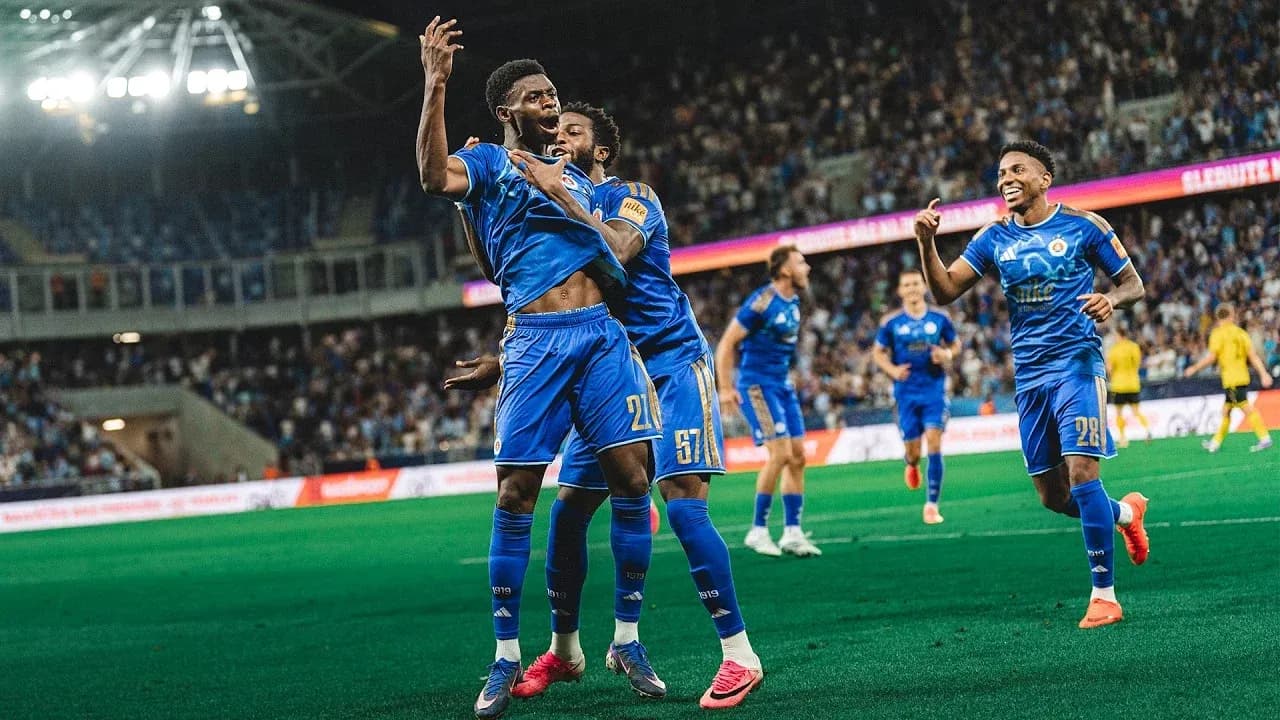 Players celebrating a goal during UEFA match Players celebrating a goal during UEFA match