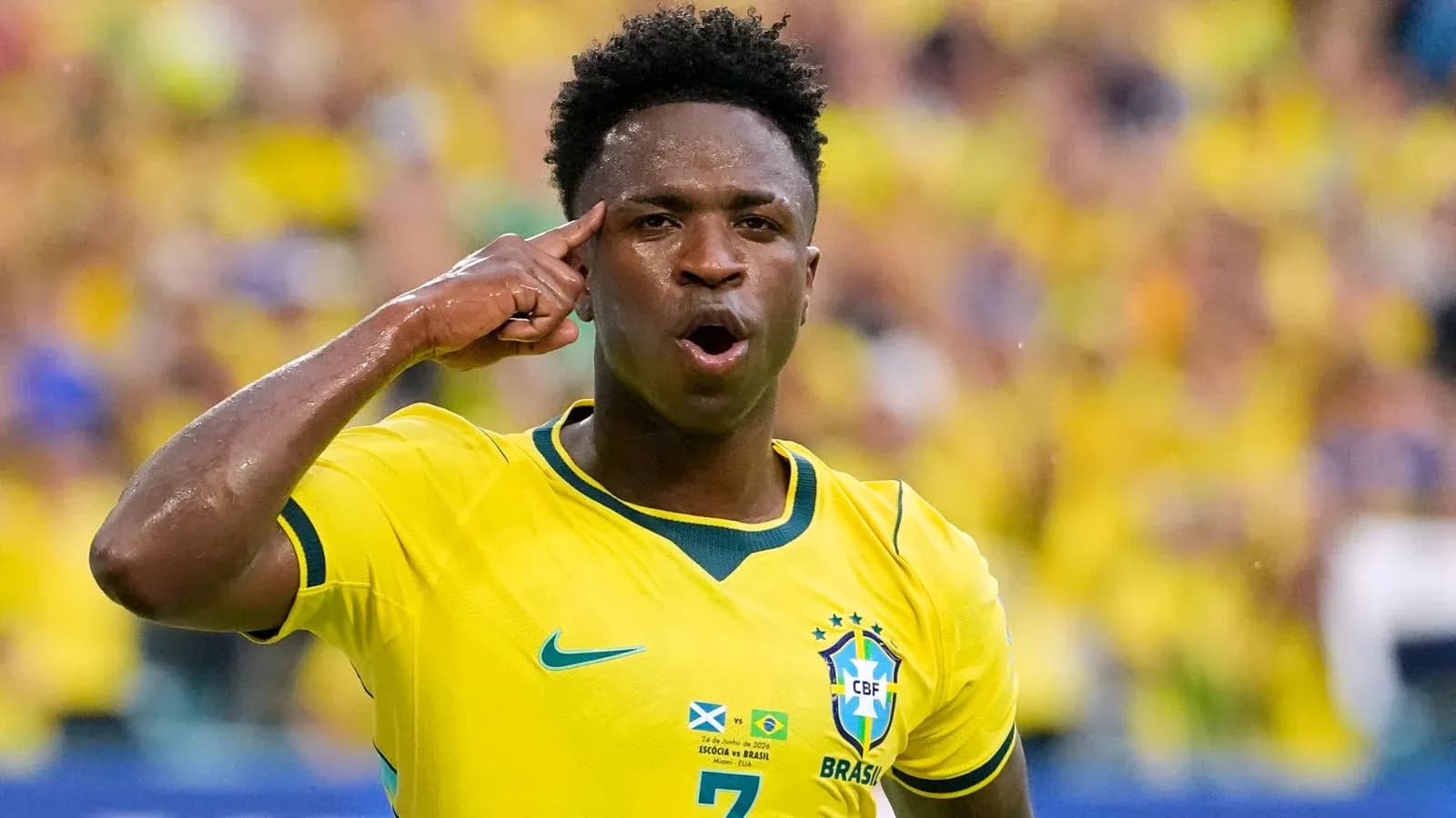Player celebrating with hand gesture in Brazil jersey Player celebrating with hand gesture in Brazil jersey