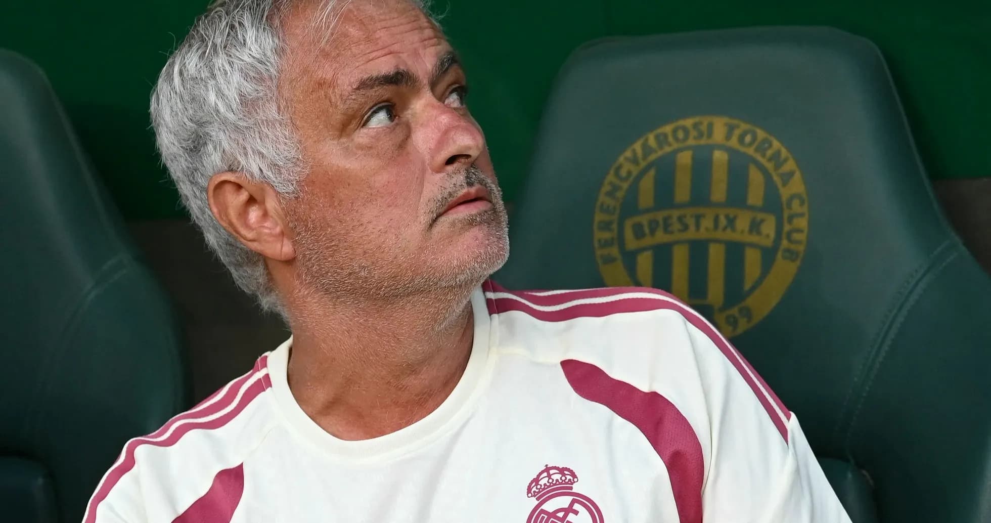 Coach observing from the bench during match Coach observing from the bench during match