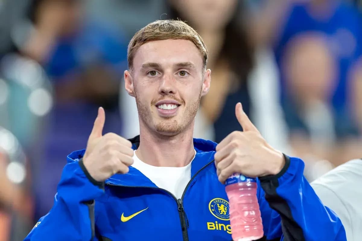 Player giving thumbs up in Chelsea jacket Player giving thumbs up in Chelsea jacket