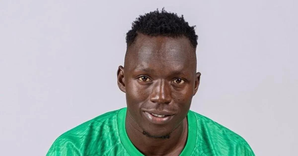 Player in green jersey posing for portrait photo Player in green jersey posing for portrait photo