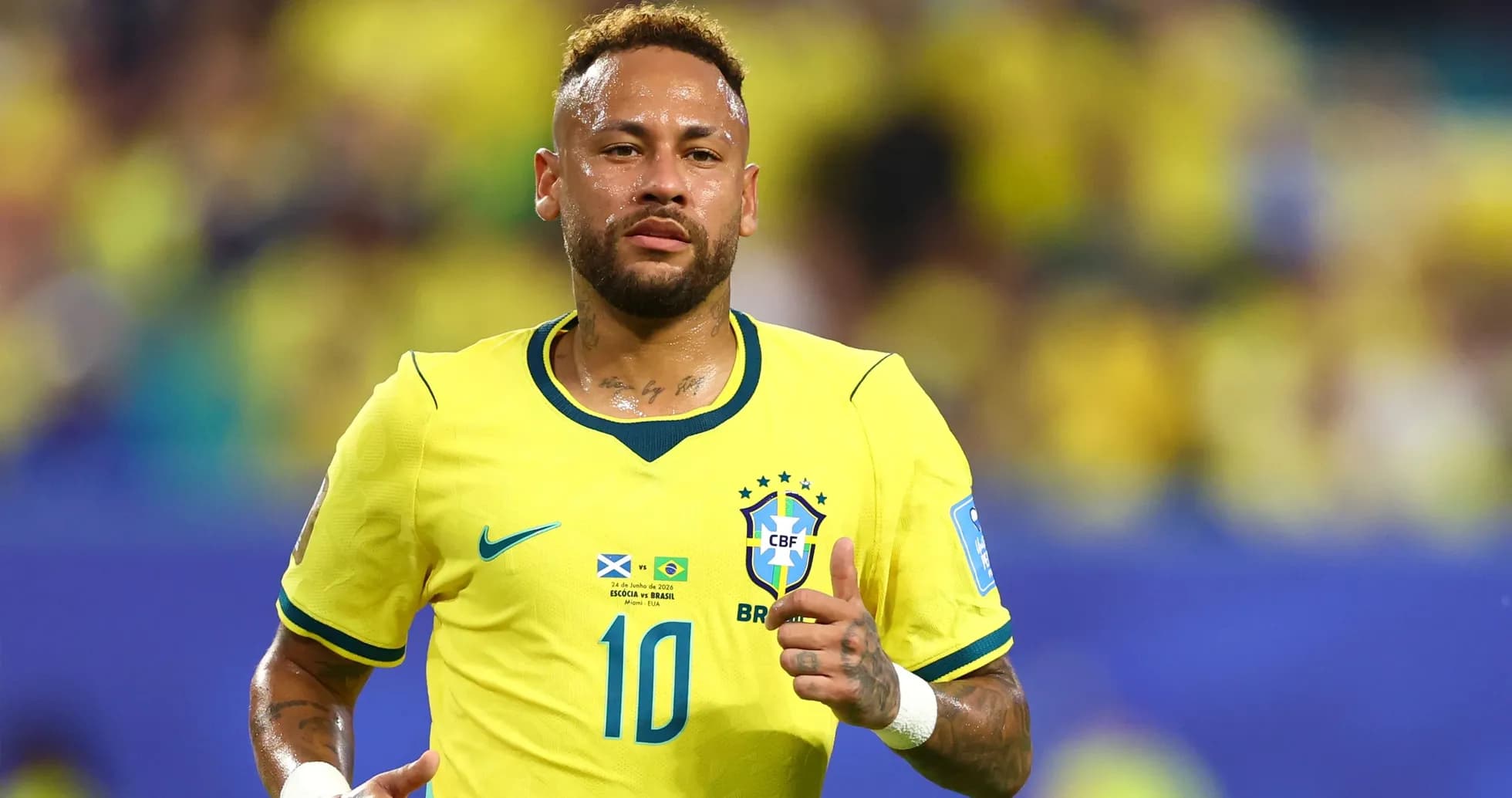 Neymar running in Brazil's yellow football kit Neymar running in Brazil's yellow football kit