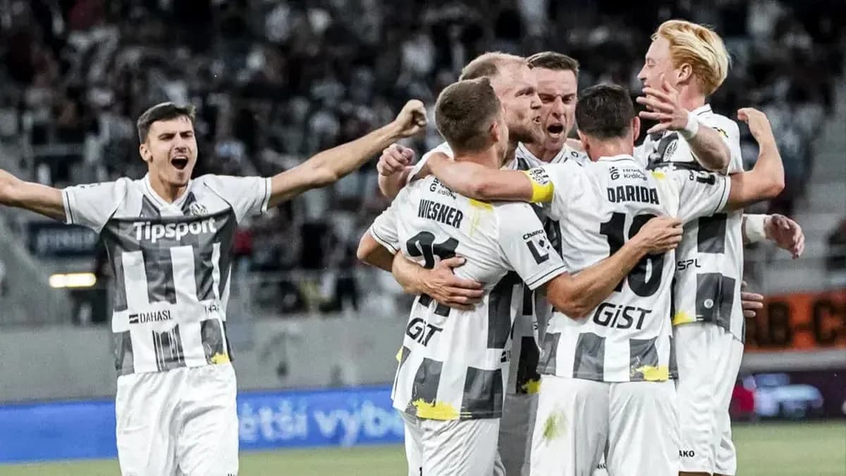 Players celebrating a goal during match Players celebrating a goal during match