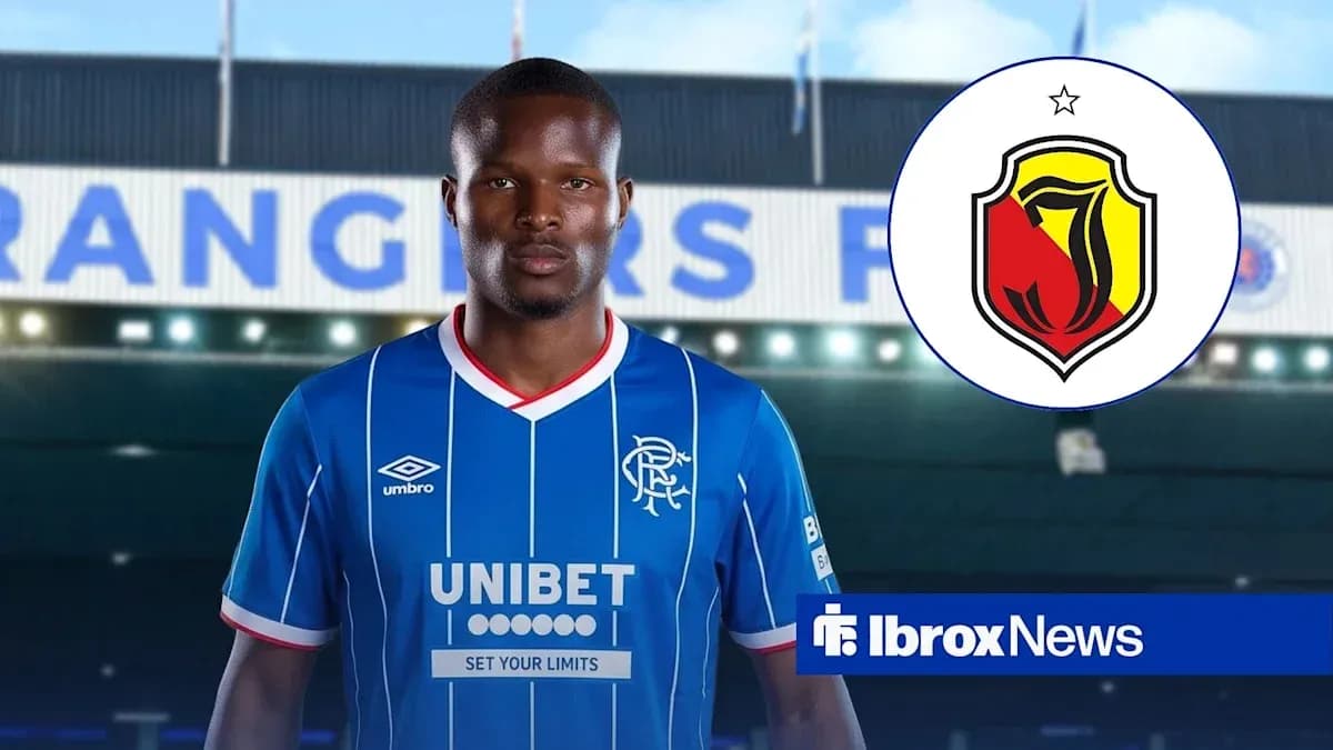 Player in Rangers jersey with club logo background Player in Rangers jersey with club logo background