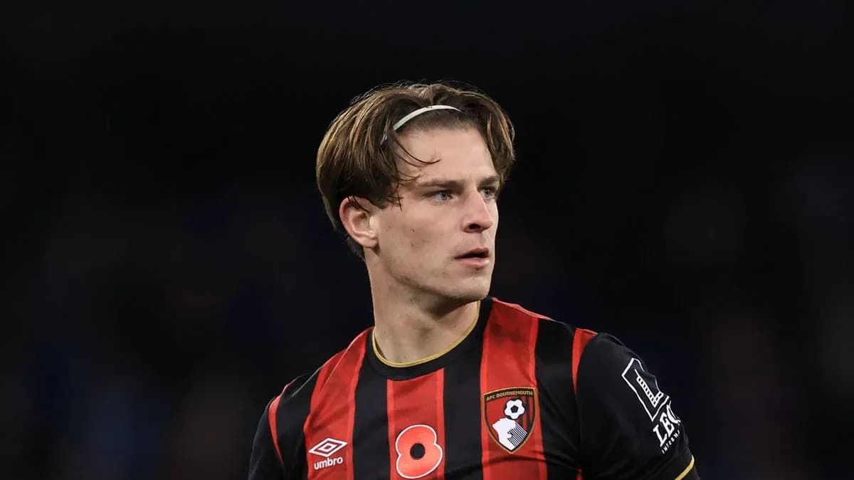 Player wearing AFC Bournemouth jersey on the field Player wearing AFC Bournemouth jersey on the field