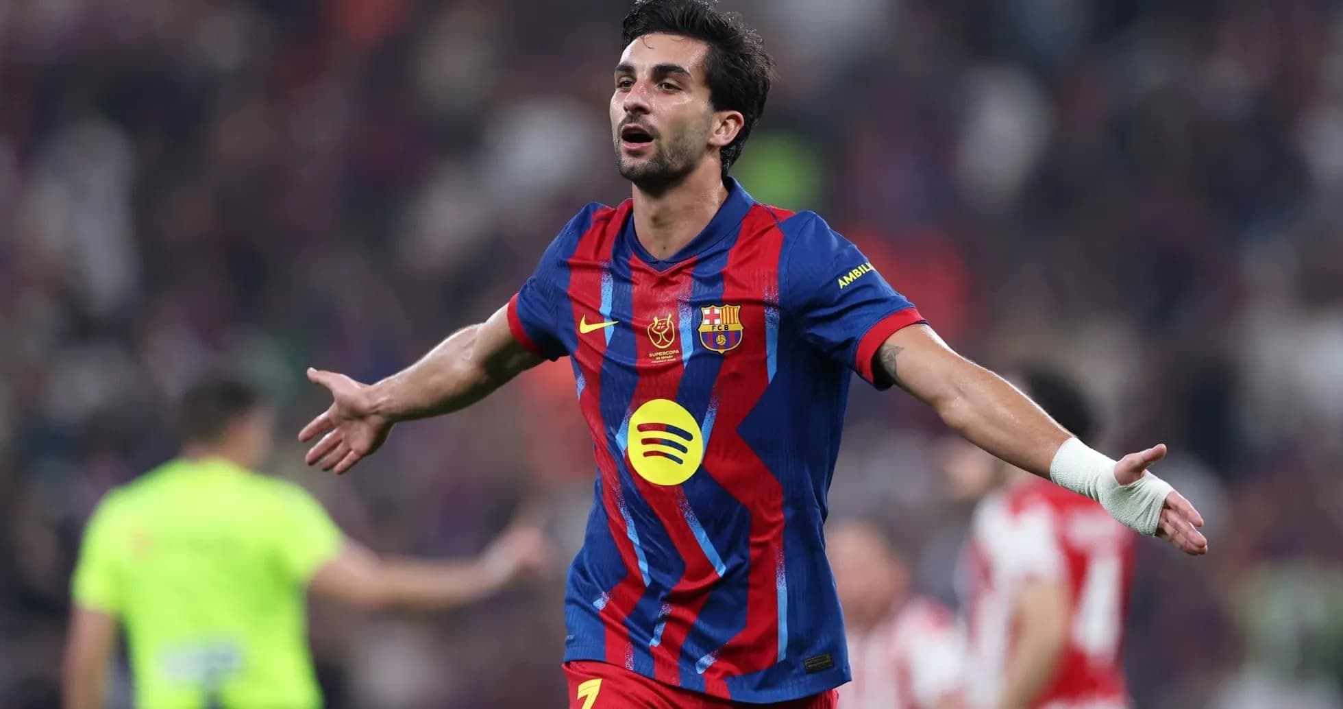 Player celebrating after scoring a goal for Barcelona Player celebrating after scoring a goal for Barcelona