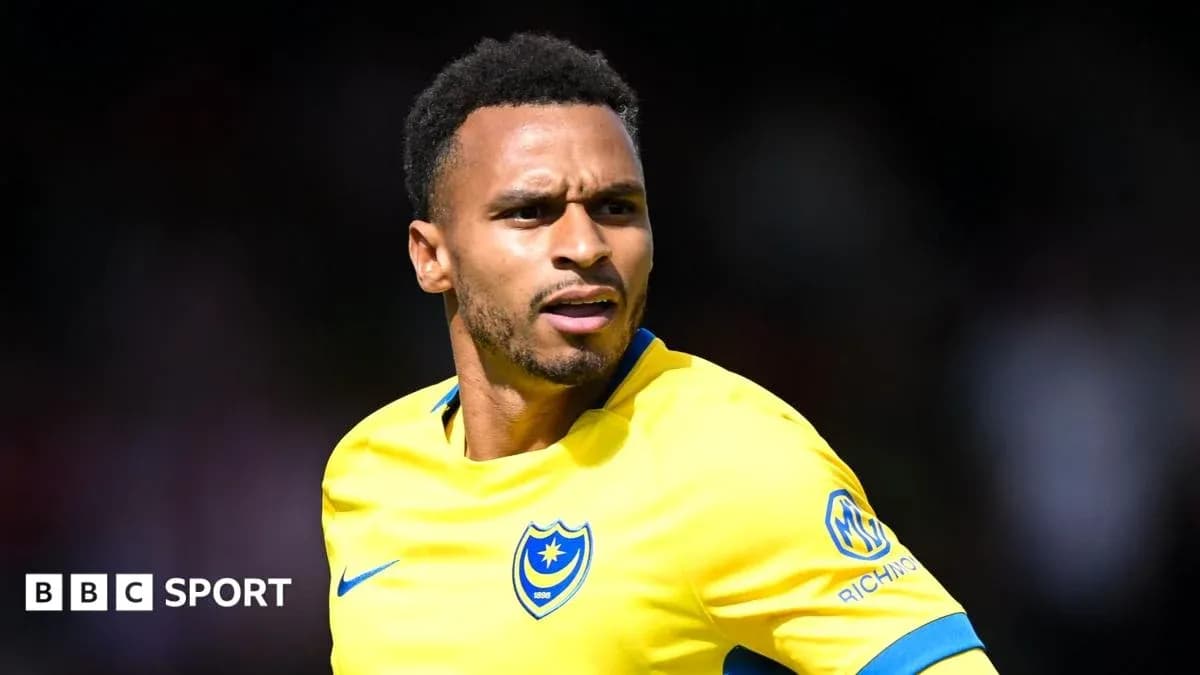 Player in yellow jersey during football match Player in yellow jersey during football match