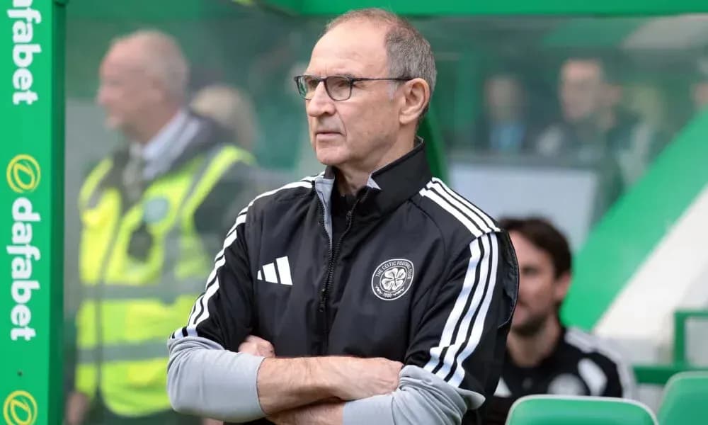 Manager observing from the sidelines during match Manager observing from the sidelines during match