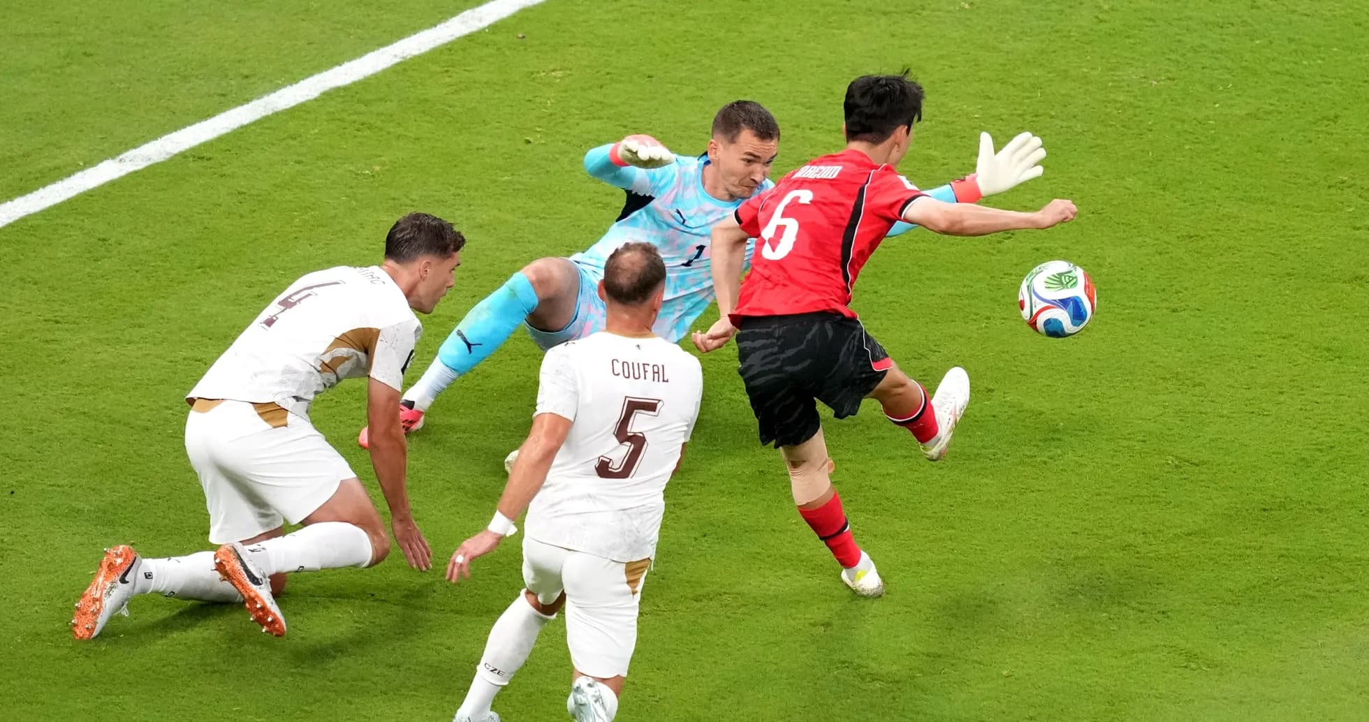 South Korea player attempts to score against Czech Republic South Korea player attempts to score against Czech Republic
