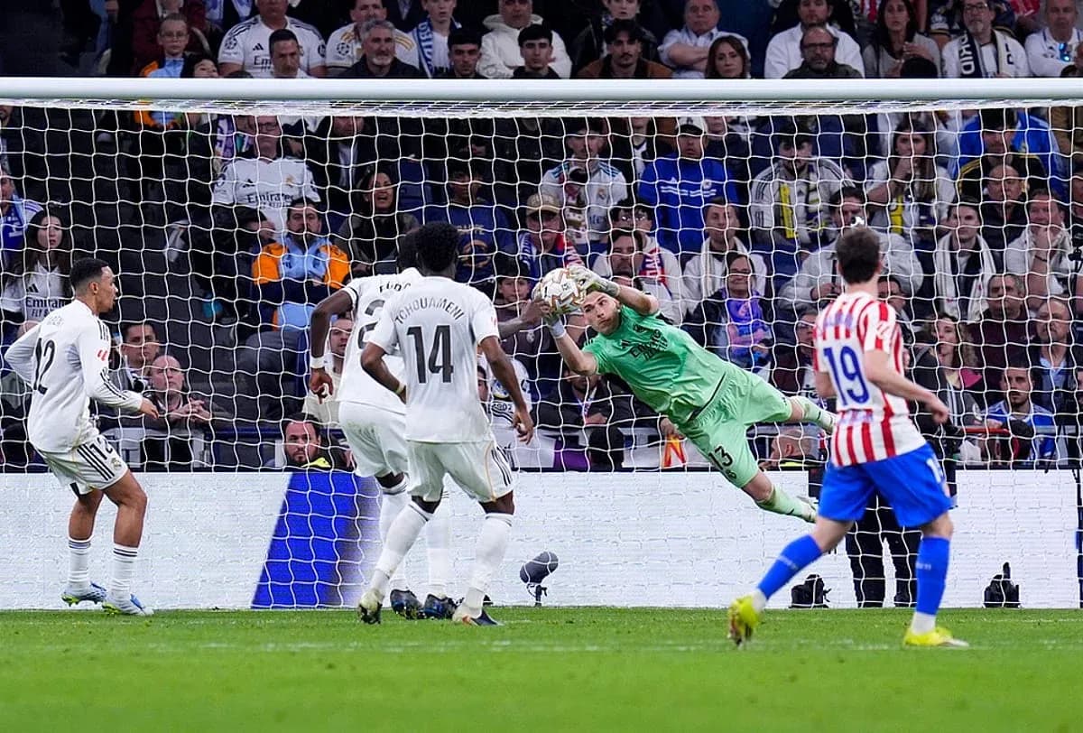 Goalkeeper saving a penalty in Madrid derby Goalkeeper saving a penalty in Madrid derby