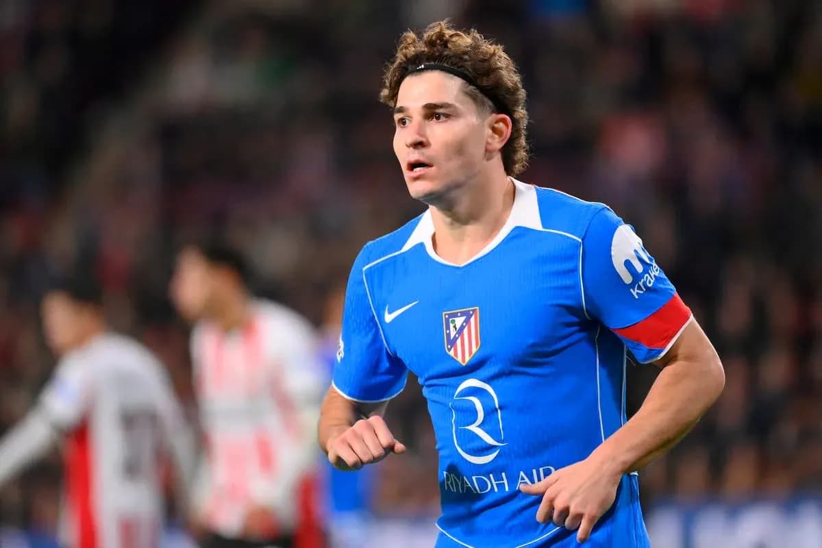 Player in blue Atletico Madrid jersey during match Player in blue Atletico Madrid jersey during match