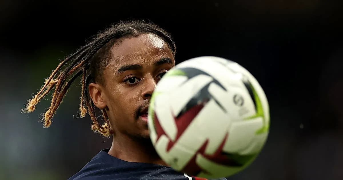 Player controlling a soccer ball during warm-up Player controlling a soccer ball during warm-up