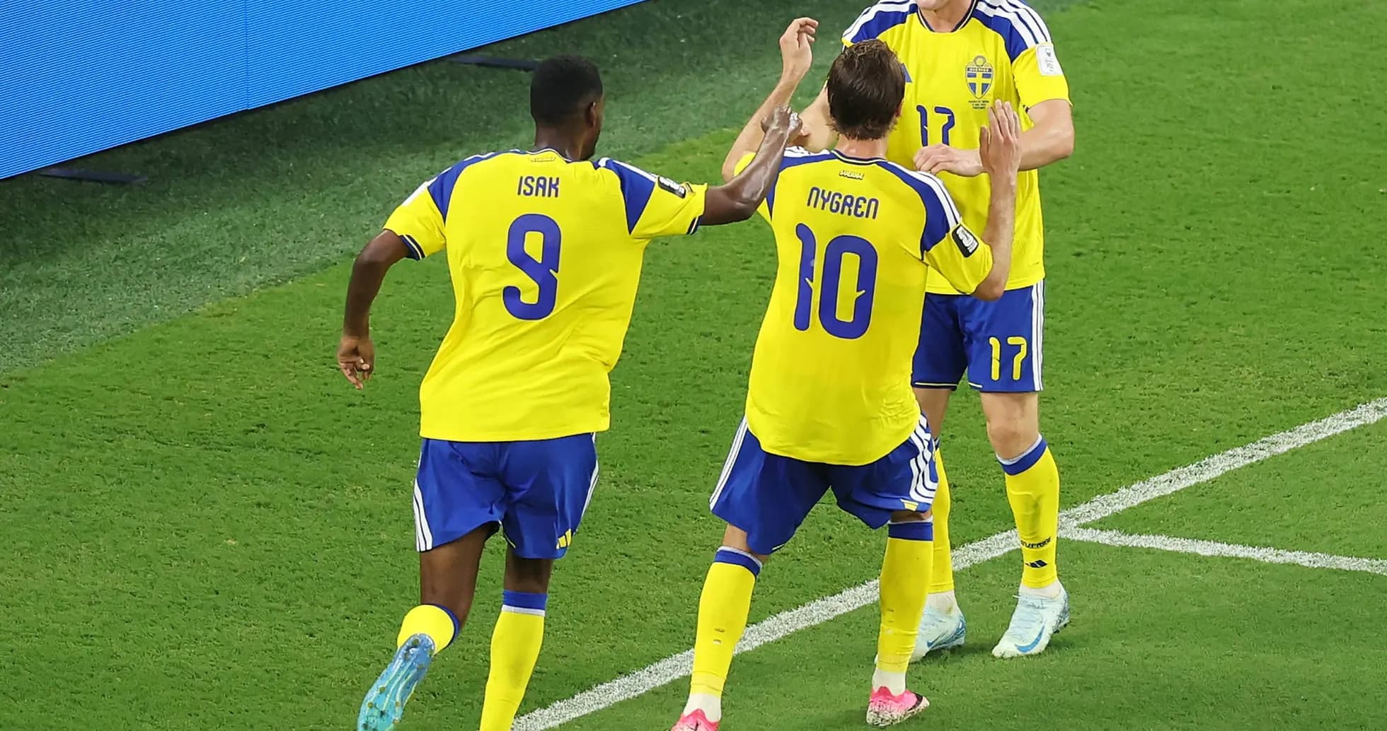 Sweden players celebrating a goal in match Sweden players celebrating a goal in match