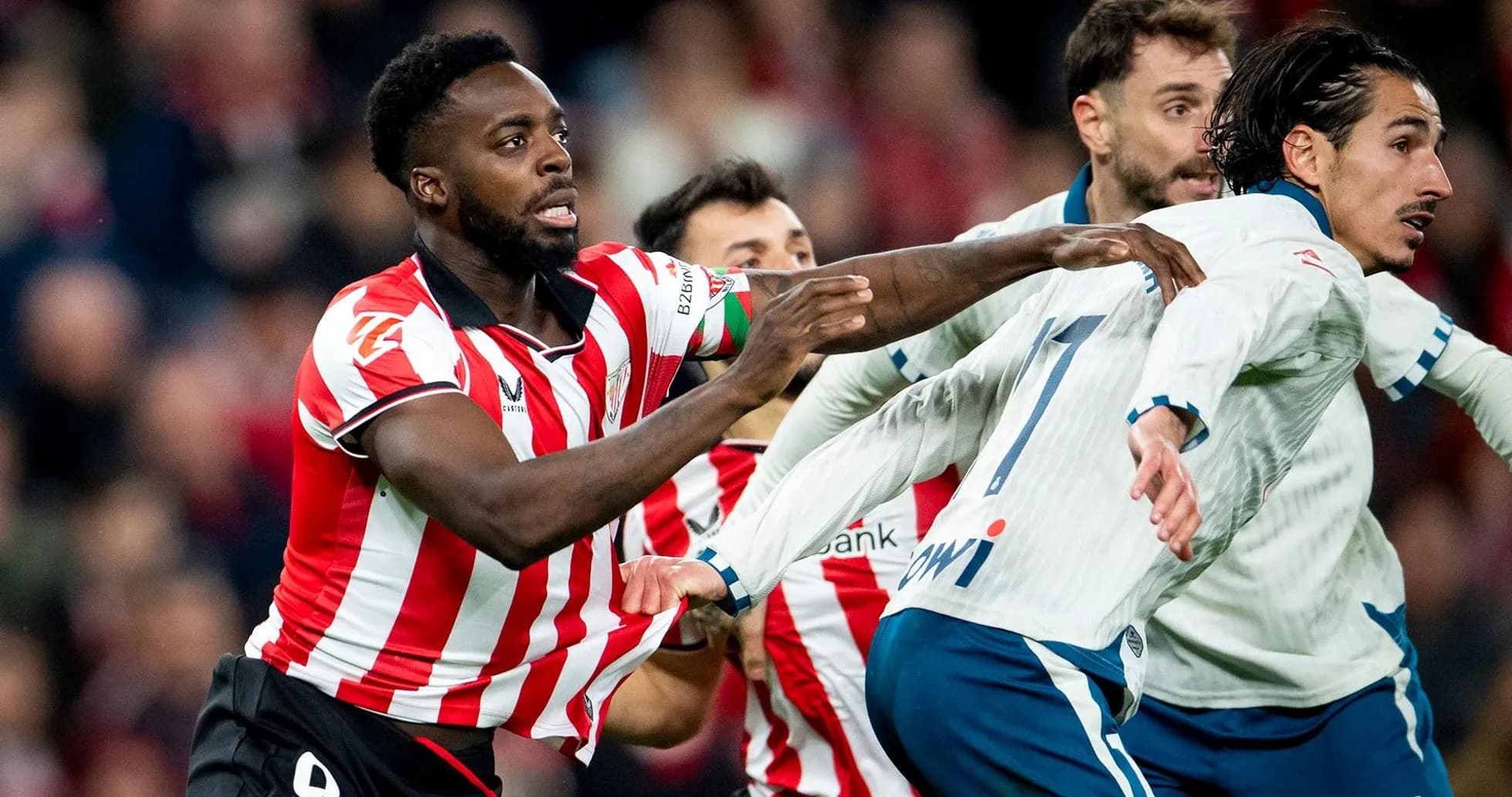 Athletic Club players contesting for the ball Athletic Club players contesting for the ball