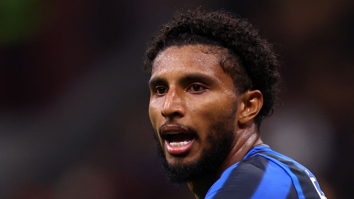 Player speaking during a football match Player speaking during a football match