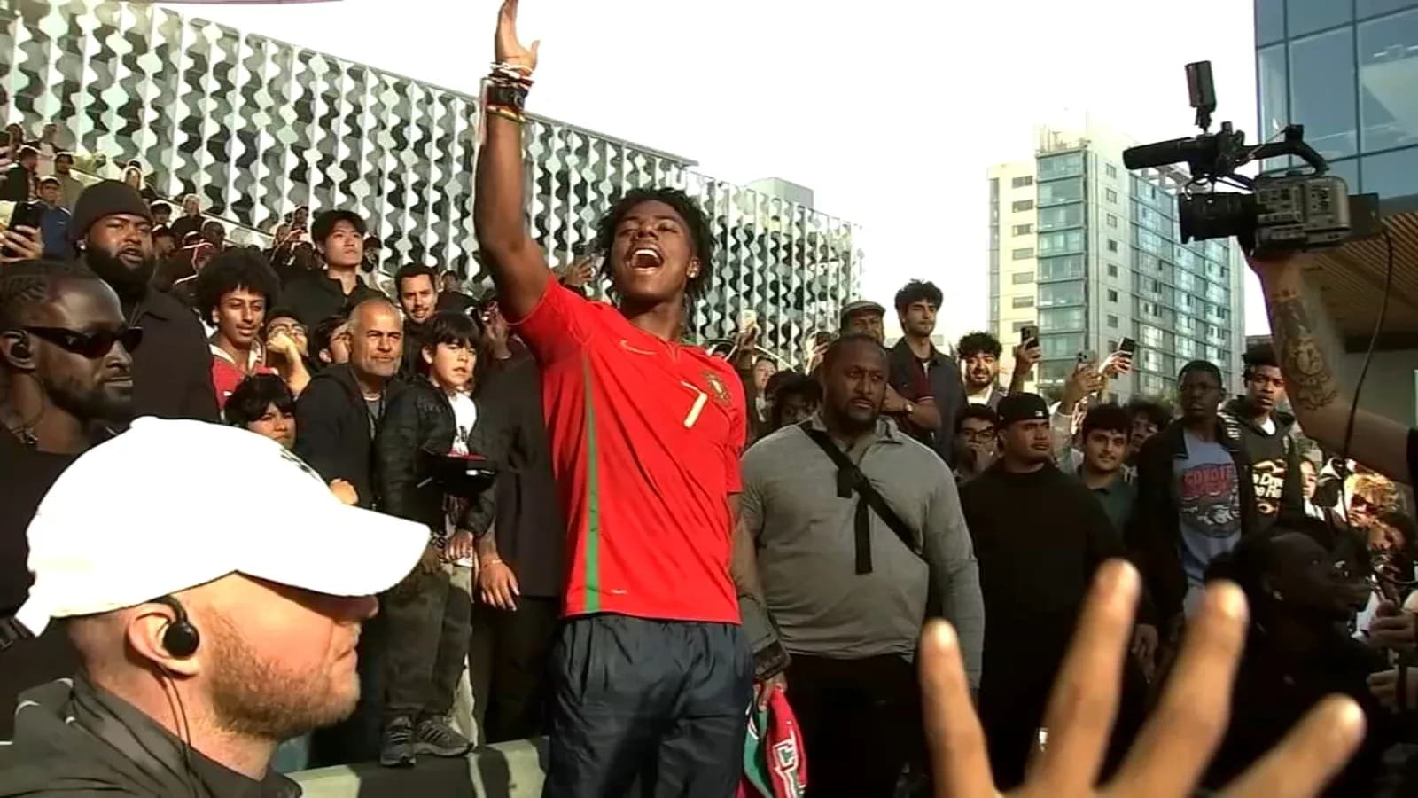 Fan celebrating in Portugal jersey at event Fan celebrating in Portugal jersey at event