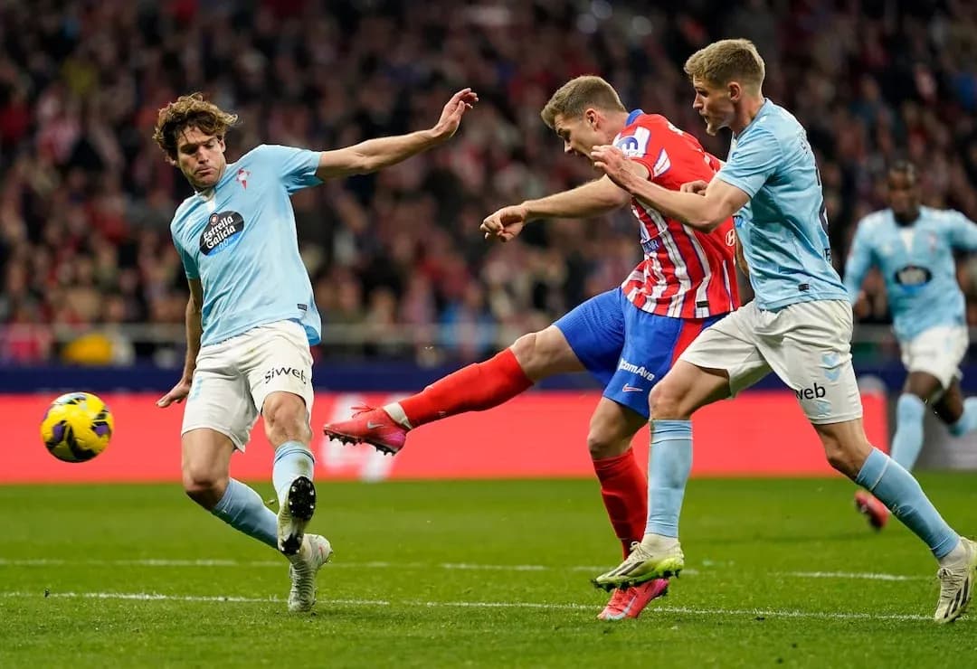 Atletico Madrid player shooting during match Atletico Madrid player shooting during match