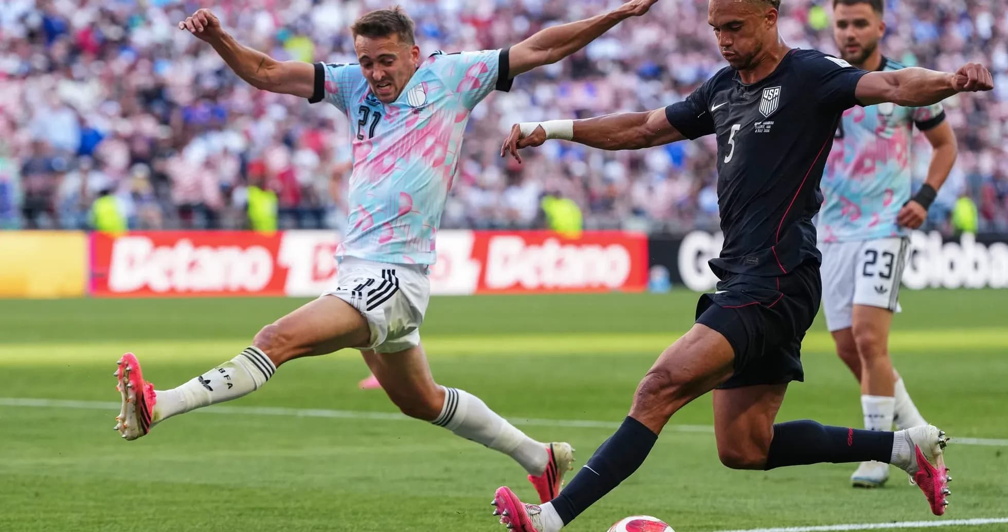 Player kicking ball during USA vs Belgium match Player kicking ball during USA vs Belgium match