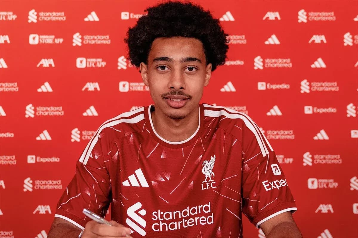 Player signing contract at Liverpool FC announcement event Player signing contract at Liverpool FC announcement event
