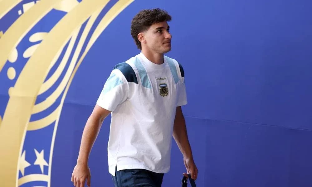 Player walking towards venue with team shirt Player walking towards venue with team shirt