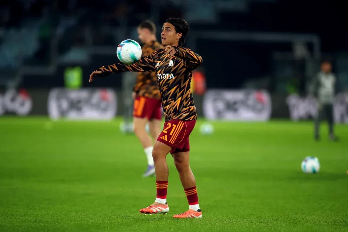 Player warming up and juggling a soccer ball Player warming up and juggling a soccer ball