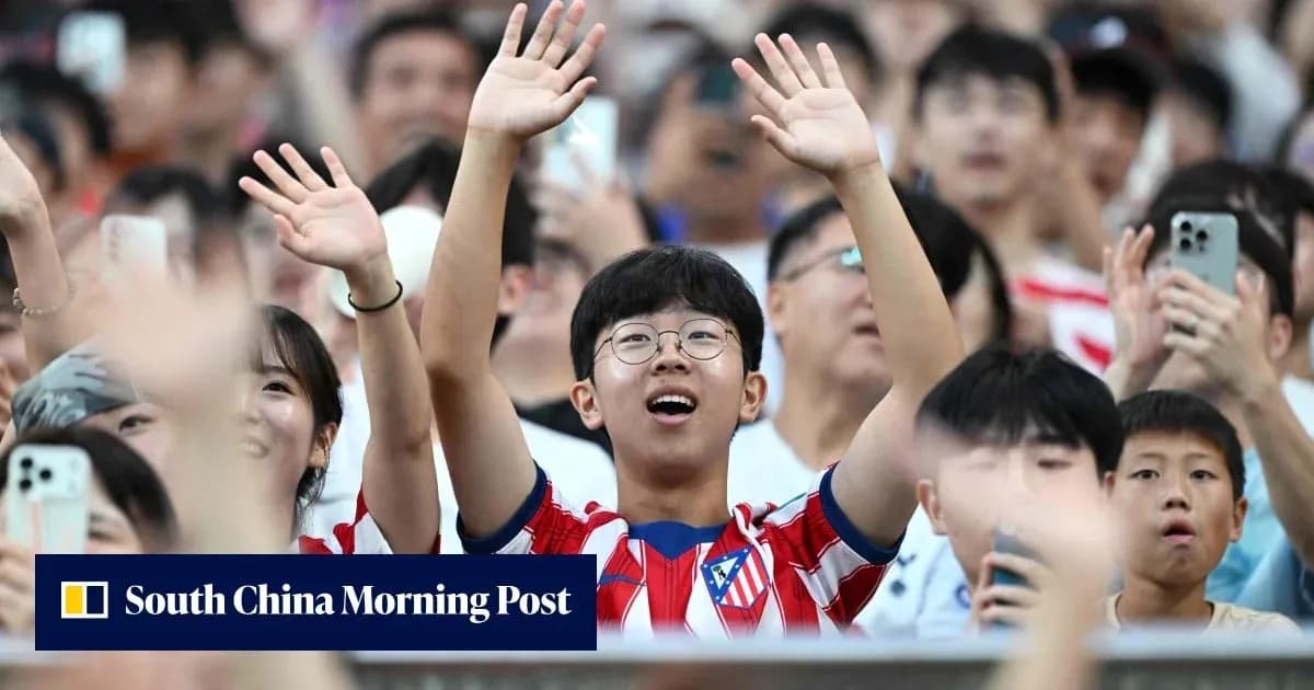 Fans cheering in stadium, wearing team jerseys Fans cheering in stadium, wearing team jerseys