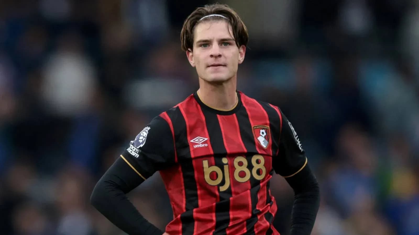 Bournemouth player wearing home kit on field Bournemouth player wearing home kit on field