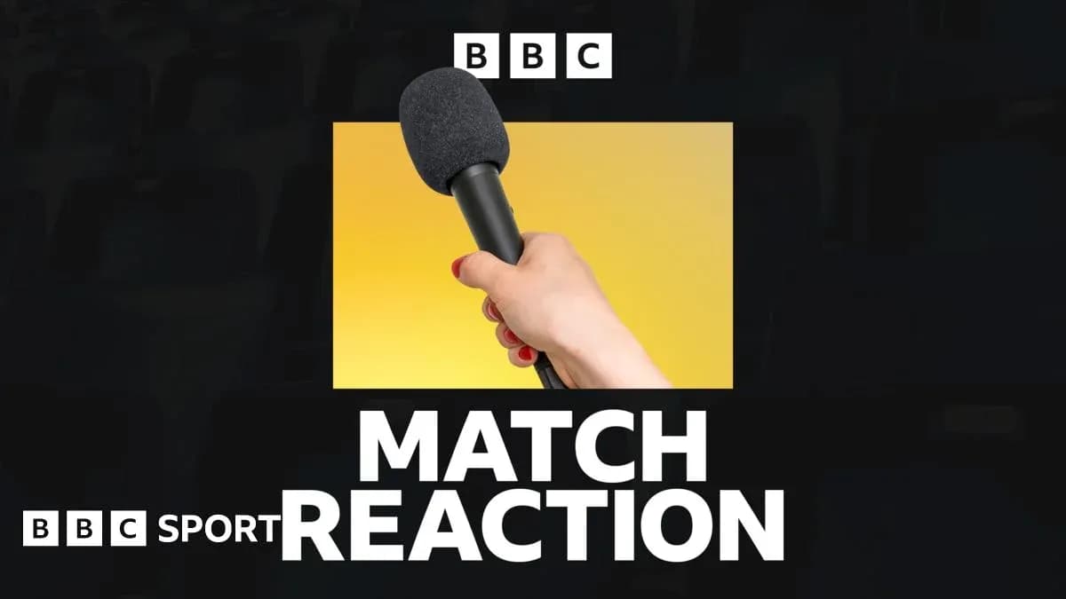 Hand holding a microphone for match reaction Hand holding a microphone for match reaction
