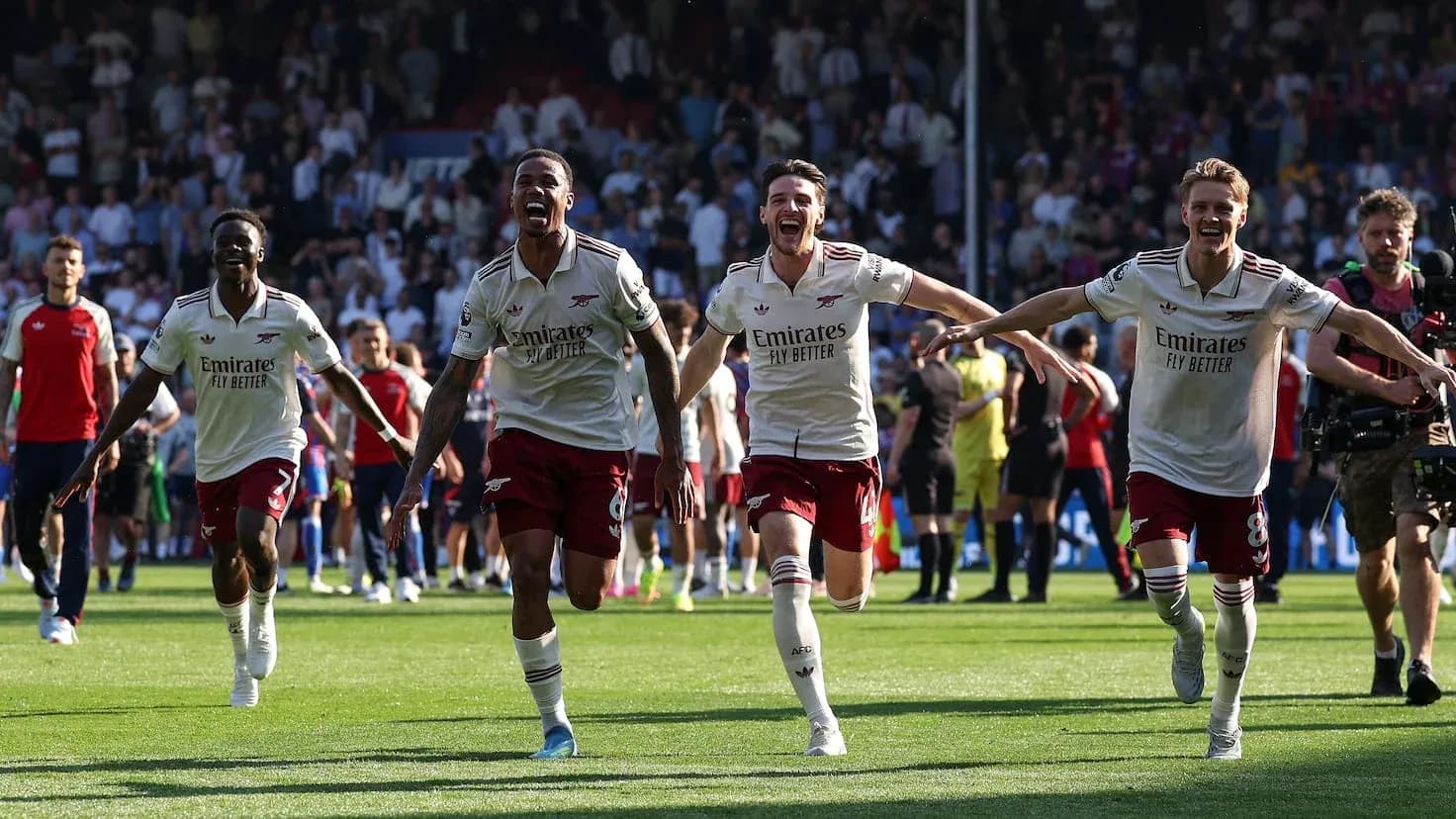 Arsenal players celebrating a goal during match Arsenal players celebrating a goal during match