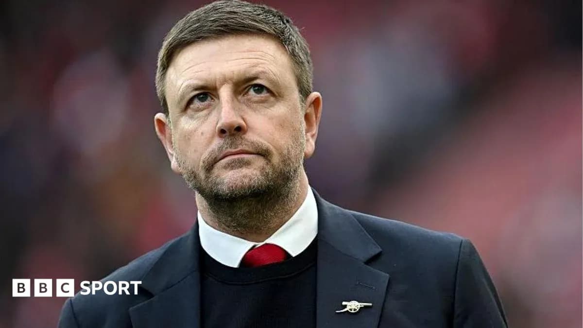 Manager looking on during a football match Manager looking on during a football match