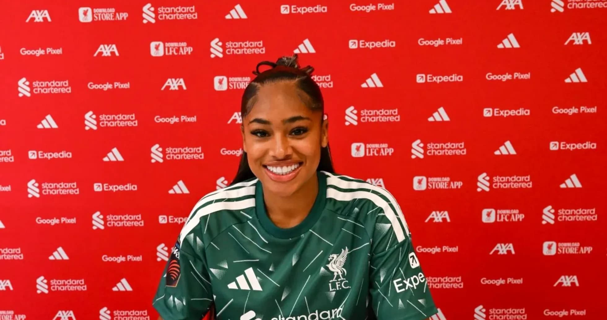 Goalkeeper in Liverpool kit at press conference Goalkeeper in Liverpool kit at press conference