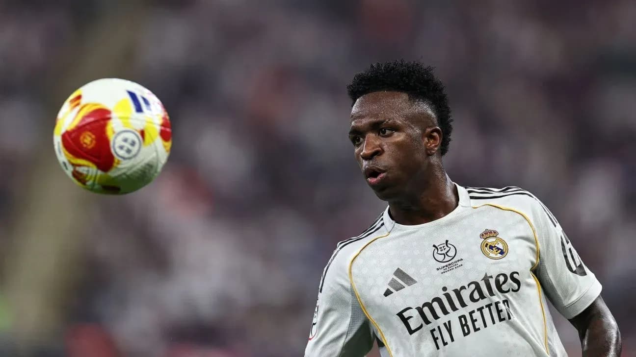 Vinícius Júnior controlling the ball during a match Vinícius Júnior controlling the ball during a match