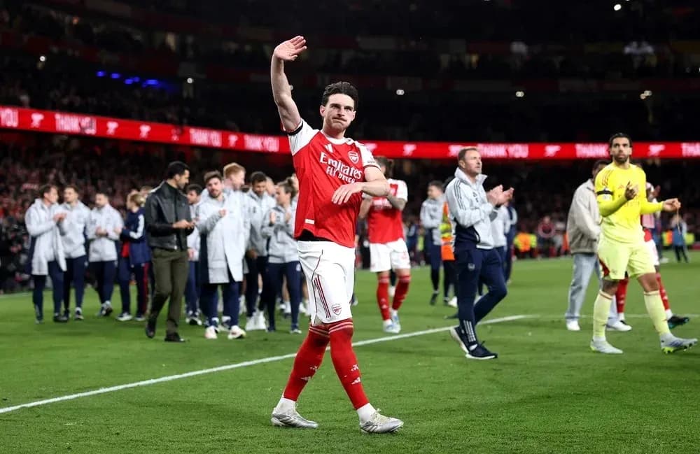 Player waving to fans after match at Emirates Stadium Player waving to fans after match at Emirates Stadium