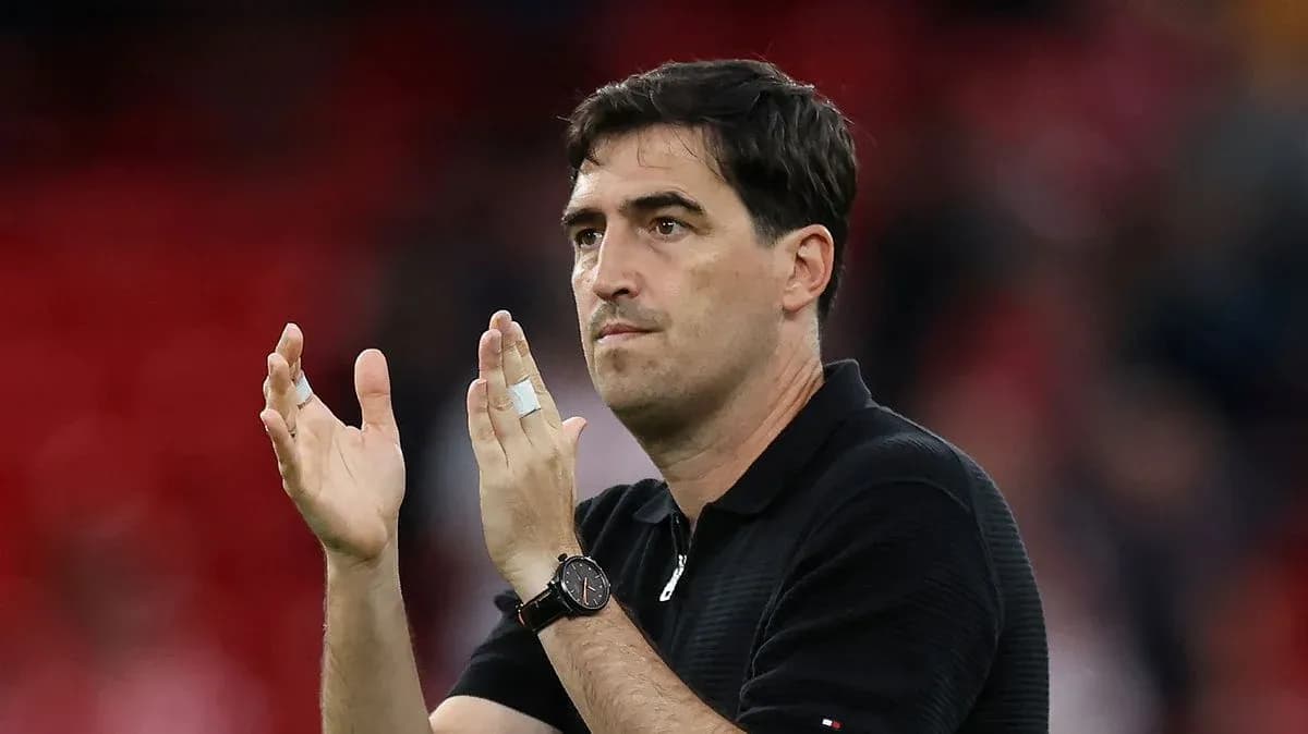 Coach applauding fans in stadium after match Coach applauding fans in stadium after match