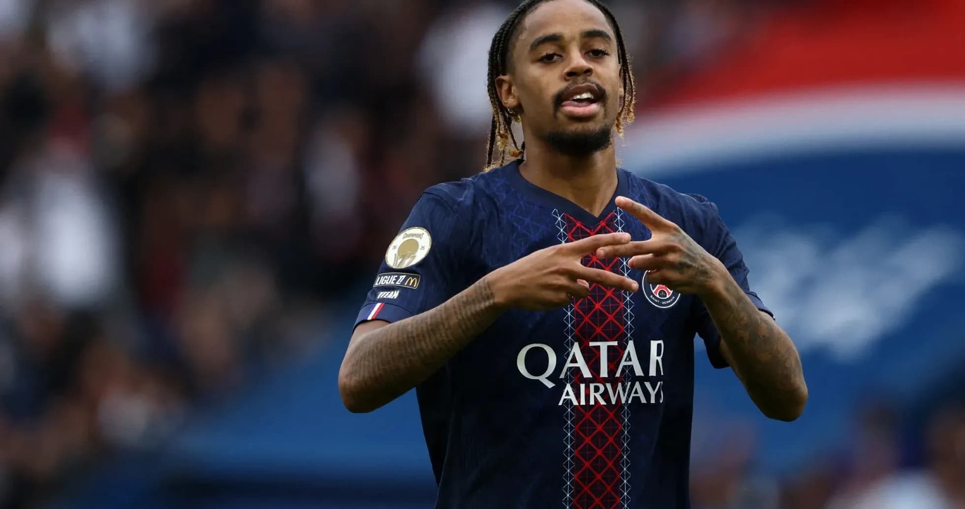 Player celebrating during a match for PSG Player celebrating during a match for PSG