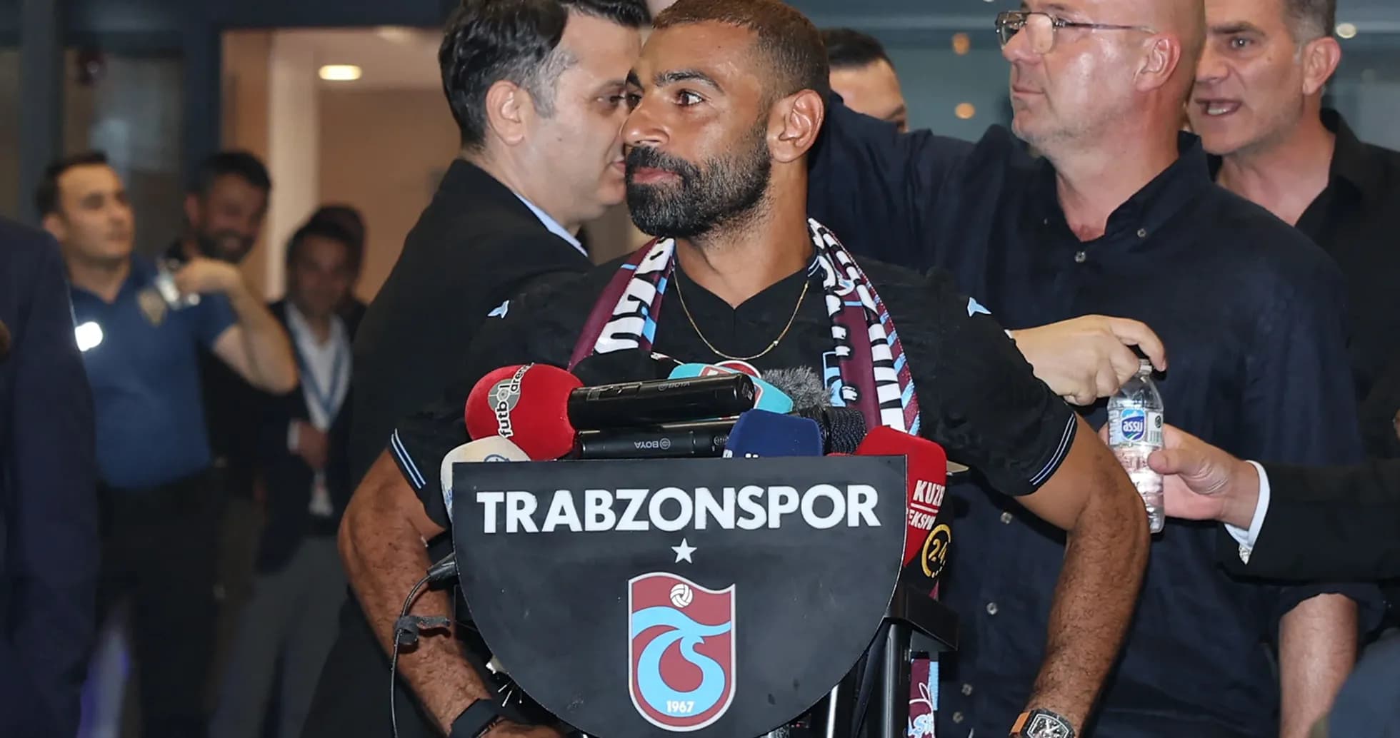 Player at Trabzonspor press conference with microphones Player at Trabzonspor press conference with microphones