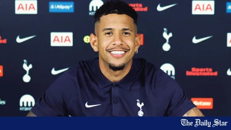 Player smiling during press conference at Tottenham Player smiling during press conference at Tottenham