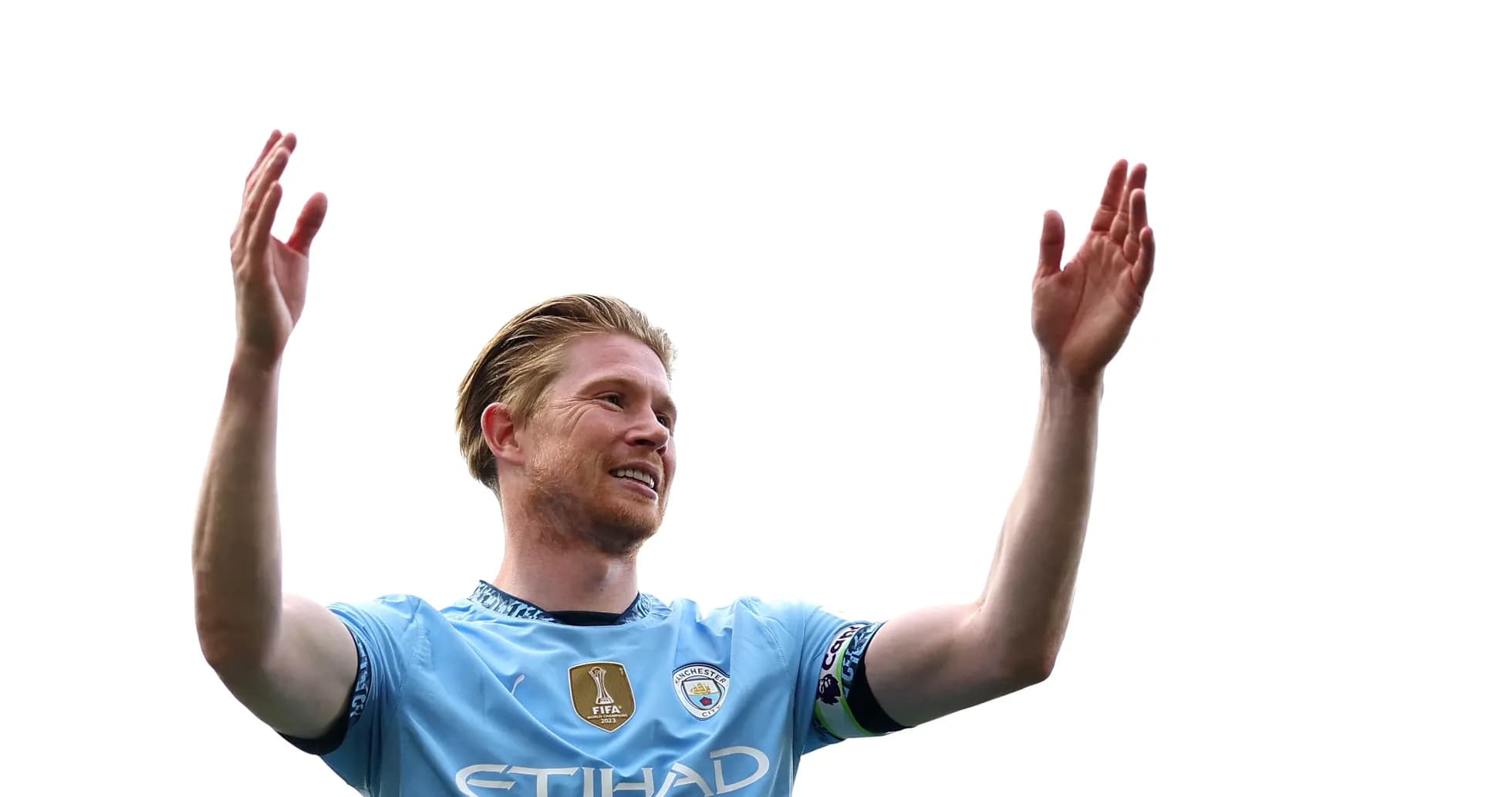 Player celebrating with arms raised on field Player celebrating with arms raised on field