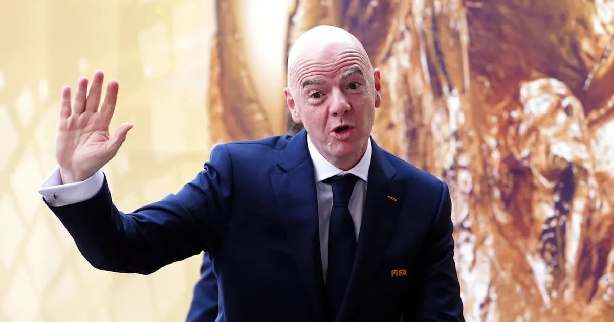 FIFA official waving during a public appearance FIFA official waving during a public appearance