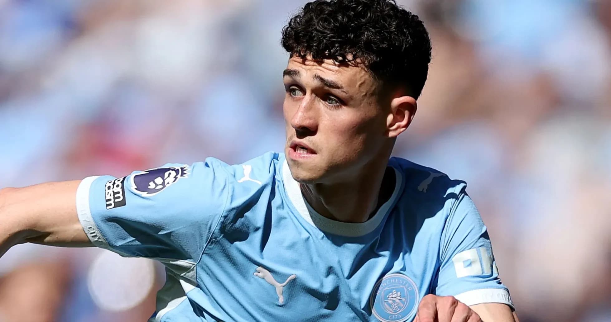 Phil Foden in action during a match Phil Foden in action during a match